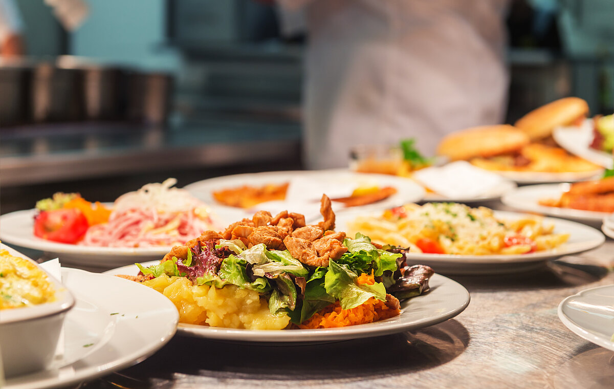 Food orders on the kitchen table in the restaurant