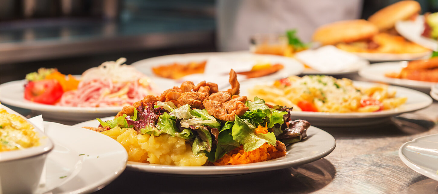 Food orders on the kitchen table in the restaurant