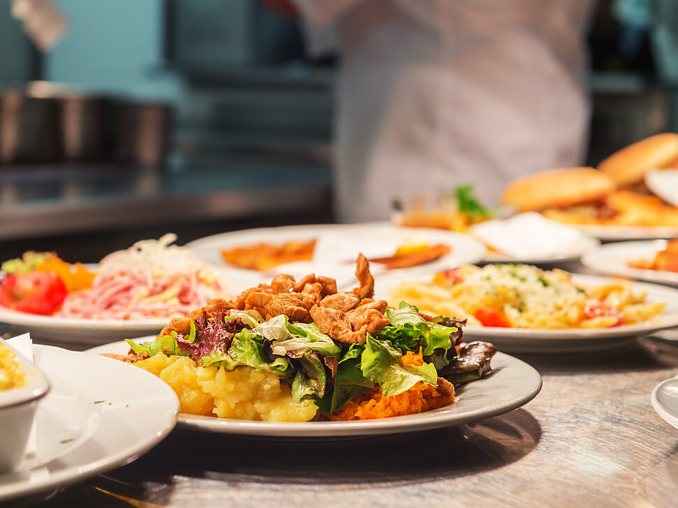 Food orders on the kitchen table in the restaurant