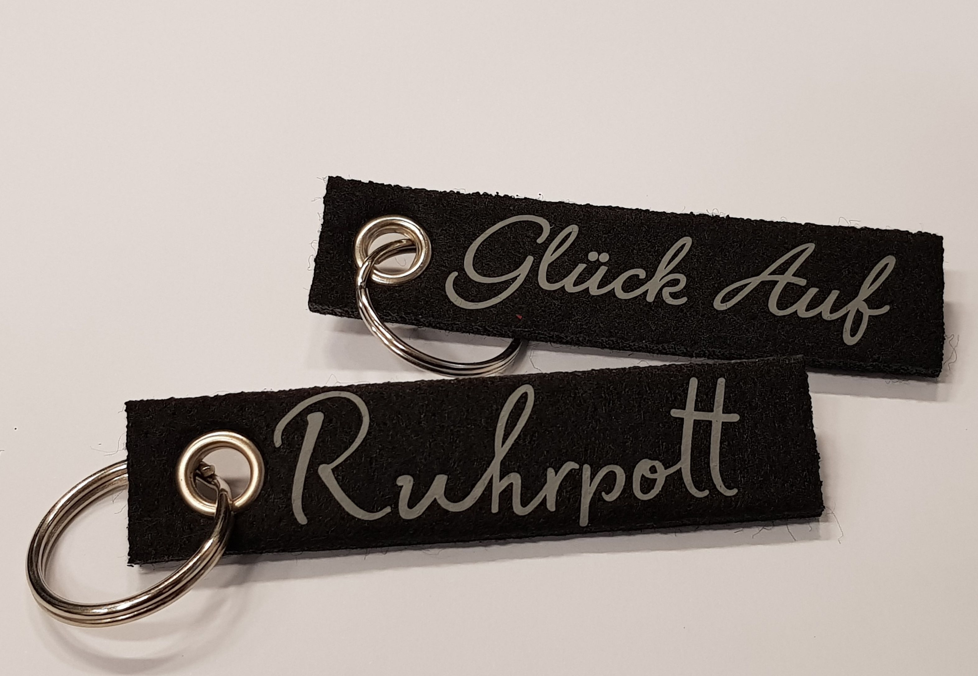 Schlüsselanhänger mit Schriftzug "Glück Auf" oder "Ruhrpott"